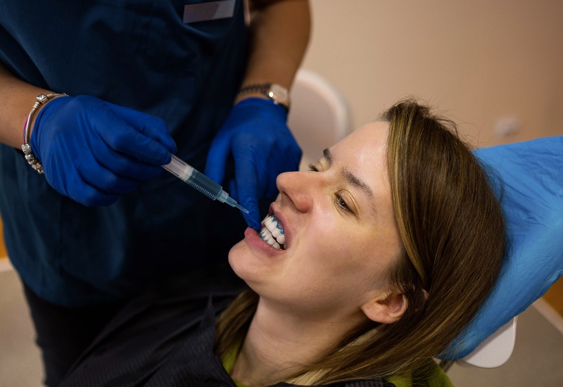 Dental procedure in Antioch, IL, with the patient receiving gum contouring treatment