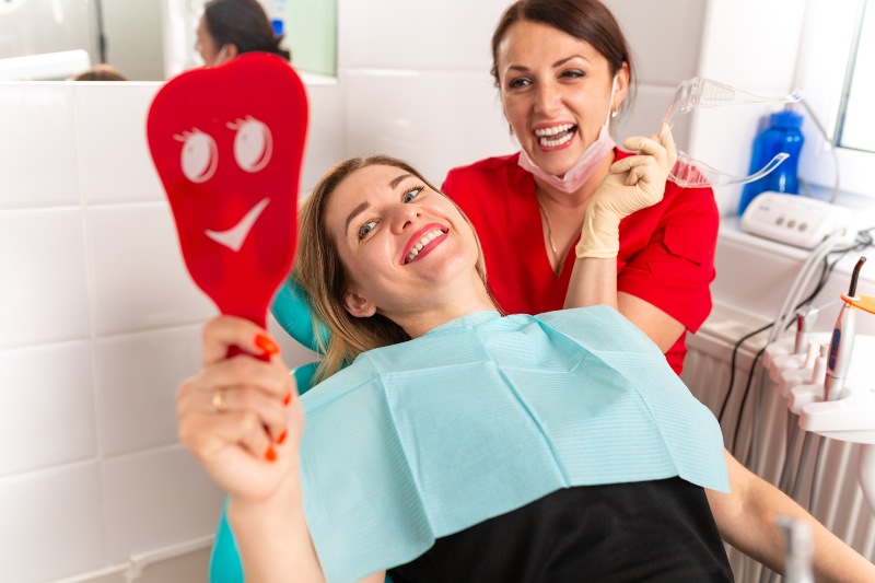 Patient discussing oral health during a dental visit in Arlington Heights, IL